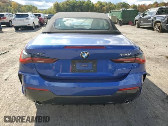 2022 BMW 4 Series 430i xDrive z VIN WBA43AT00NCH62969, wystawiony jako Copart lot #76321894 z przebiegiem Nie podano mil oraz Szkoda całkowita • Salvage title. Historia ofert i sprzedaży dostępna na DreamBid. Obrazek 6.