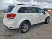 2013 Dodge Journey SXT with VIN 3C4PDCBG7DT637071, listed as a Copart auction lot 82041625 with 123,514 mi miles and Salvage title. Bid and sale history available at DreamBid. Image 3.