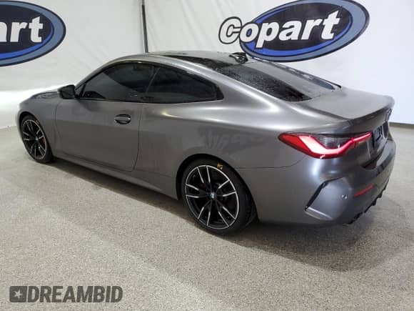 2021 BMW 4 Series 430i z VIN WBA53AP01MCG52316, wystawiony jako Copart lot #71084555 z przebiegiem 32 046 mil mil oraz Czysty tytuł • Clean title. Historia ofert i sprzedaży dostępna na DreamBid. Obrazek 2.