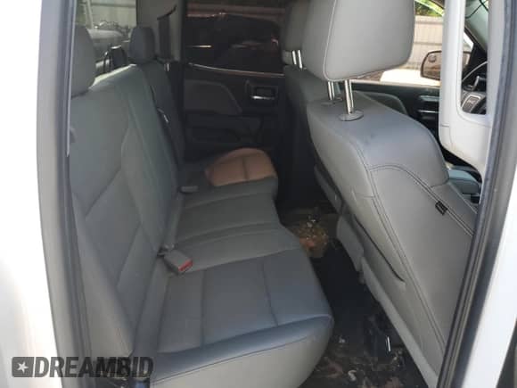 2018 GMC Sierra 1500 z VIN 1GTR1LEC9JZ290471, wystawiony jako Copart lot #62568305 z przebiegiem 242 739 mil mil oraz Czysty tytuł • Clean title. Historia ofert i sprzedaży dostępna na DreamBid. Obrazek 10.