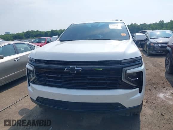 2025 Chevrolet Tahoe RST z VIN 1GNS6RRD7SR121714, wystawiony jako IAAI lot #42602552 z przebiegiem 9 824 mil mil oraz . Historia ofert i sprzedaży dostępna na DreamBid. Obrazek 12.