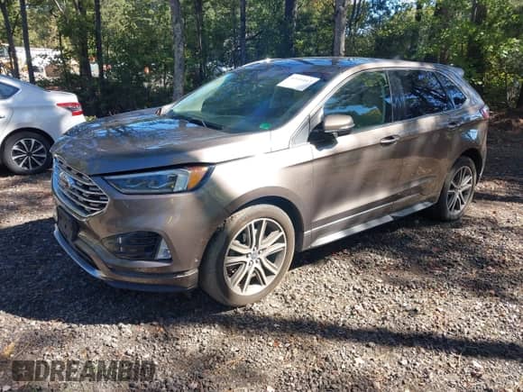 2019 Ford Edge Titanium with VIN 2FMPK4K90KBB34855, listed as a IAAI auction lot 43451017 with 94,796 mi miles and . Bid and sale history available at DreamBid. Image 18.