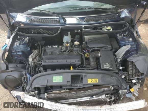 2006 MINI Hardtop z VIN WMWRC33526TK16170, wystawiony jako Copart lot #85739375 z przebiegiem 79 596 mil mil oraz Szkoda całkowita • Salvage title. Historia ofert i sprzedaży dostępna na DreamBid. Obrazek 11.