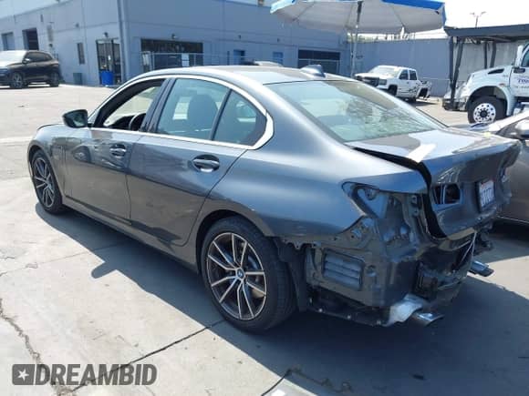 2022 BMW 3 Series 330e with VIN 3MW5P7J07N8C47132, listed as a IAAI auction lot 43228936 with 26,923 mi miles and . Bid and sale history available at DreamBid. Image 3.