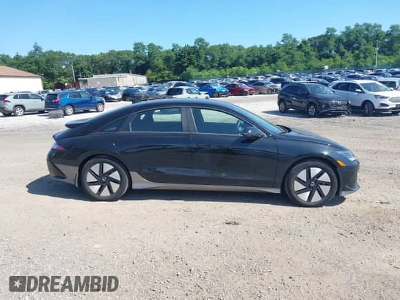 2023 Hyundai Ioniq 6 SE z VIN KMHM24AC7PA045528, wystawiony jako IAAI lot #42791381 z przebiegiem 30 065 mil mil oraz . Historia ofert i sprzedaży dostępna na DreamBid. Obrazek 14.