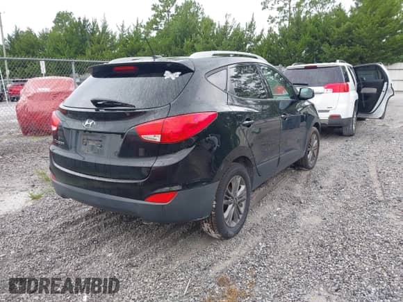 2015 Hyundai Tucson SE z VIN KM8JU3AGXFU987693, wystawiony jako IAAI lot #42989626 z przebiegiem 174 157 mil mil oraz . Historia ofert i sprzedaży dostępna na DreamBid. Obrazek 4.