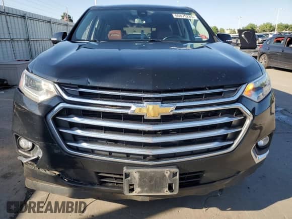 2018 Chevrolet Traverse High Country с VIN 1GNEVKKW7JJ100684, выставлен на аукционе Copart как лот 60876285 с пробегом 172 149 миль миль и Списание • Salvage title. История ставок и продаж доступна на DreamBid. Изображение 5.