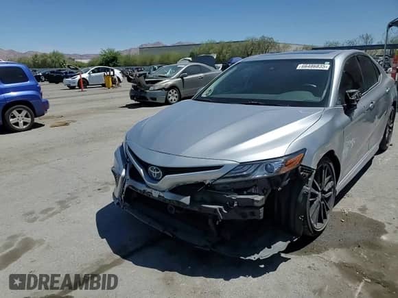 2023 Toyota Camry Hybrid XSE с VIN 4T1K31AKXPU609407, выставлен на аукционе Copart как лот 66486835 с пробегом 26 892 миль миль и Списание • Salvage title. История ставок и продаж доступна на DreamBid. Изображение 14.