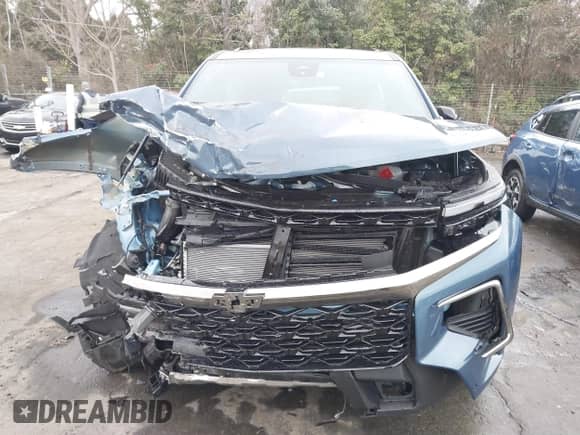 2024 Chevrolet Traverse AWD Z71 z VIN 1GNEVJKS7RJ197307, wystawiony jako IAAI lot #41505694 z przebiegiem 7 782 mil mil oraz . Historia ofert i sprzedaży dostępna na DreamBid. Obrazek 6.