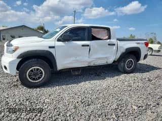 2011 Toyota Tundra с VIN 5TFDW5F10BX185268, выставлен на аукционе Copart как лот 85114585 с пробегом 143 651 миль миль и Списание • Salvage title. История ставок и продаж доступна на DreamBid. Изображение 1.