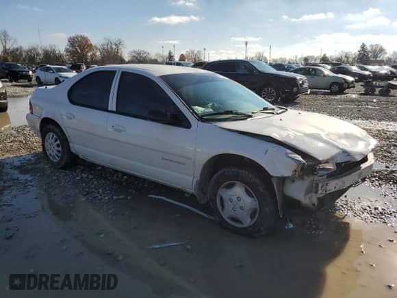 1999 Dodge Stratus with VIN 1B3EJ46X5XN631663, listed as a Copart auction lot 82223874 with Not provided miles and Salvage title. Bid and sale history available at DreamBid. Image 4.