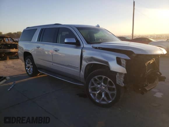 2019 Chevrolet Suburban Premier with VIN 1GNSCJKC7KR149136, listed as a Copart auction lot 72937124 with 56,750 mi miles and Clean title. Bid and sale history available at DreamBid. Image 4.