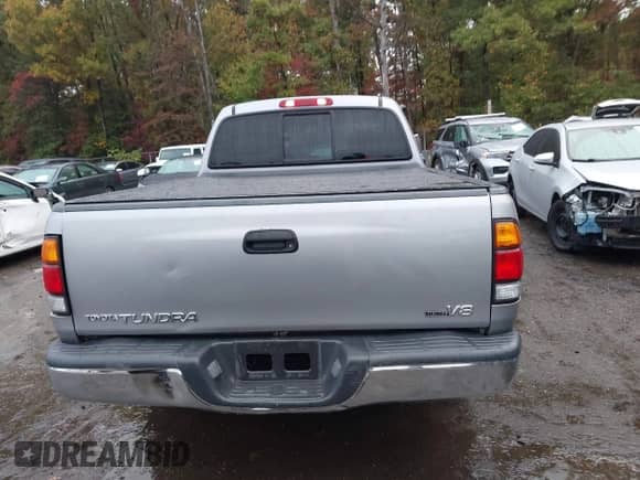 2002 Toyota Tundra SR5 z VIN 5TBRT34122S270133, wystawiony jako IAAI lot #43419031 z przebiegiem 104 846 mil mil oraz . Historia ofert i sprzedaży dostępna na DreamBid. Obrazek 16.