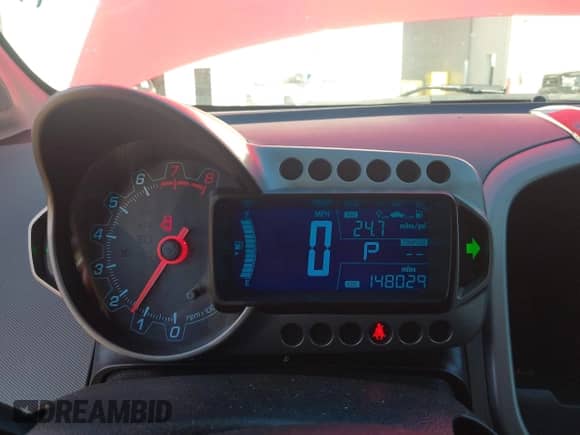2015 Chevrolet Sonic LTZ with VIN 1G1JE5SB7F4202054, listed as a IAAI auction lot 42174396 with 148,029 mi miles and . Bid and sale history available at DreamBid. Image 7.