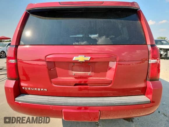 2015 Chevrolet Suburban LT with VIN 1GNSCJKCXFR669501, listed as a Copart auction lot 80585365 with 130,125 mi miles and Salvage title. Bid and sale history available at DreamBid. Image 6.