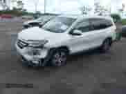 2017 Honda Pilot EX-L with VIN 5FNYF5H57HB043651, listed as a IAAI auction lot 42728498 with 122,316 mi miles and . Bid and sale history available at DreamBid. Image 2.