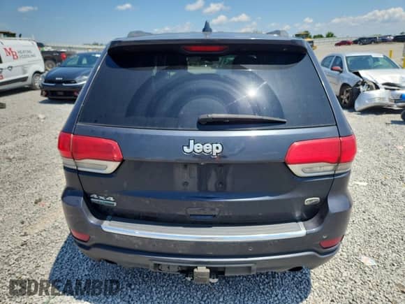2015 Jeep Grand Cherokee High Altitude z VIN 1C4RJFCM5FC855631, wystawiony jako Copart lot #66723425 z przebiegiem 136 237 mil mil oraz Szkoda całkowita • Salvage title. Historia ofert i sprzedaży dostępna na DreamBid. Obrazek 6.