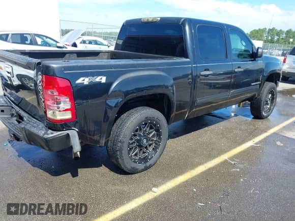 2008 GMC Sierra 1500 SL with VIN 2GTEK13C281133130, listed as a IAAI auction lot 42625085 with 301,303 mi miles and . Bid and sale history available at DreamBid. Image 4.