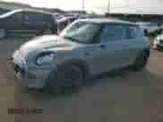 2015 MINI Hardtop with VIN WMWXM5C50FT937233, listed as a Copart auction lot 50077295 with 87,785 mi miles and Salvage title. Bid and sale history available at DreamBid. Image 1.