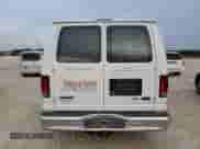 2009 Ford Econoline Cargo Commercial с VIN 1FTNE14W69DA79580, выставлен на аукционе Copart как лот 77773694 с пробегом Не указан миль и Списание • Salvage title. История ставок и продаж доступна на DreamBid. Изображение 6.
