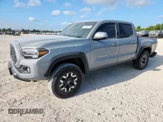 2020 Toyota Tacoma SR5 with VIN 5TFCZ5AN8LX221304, listed as a Copart auction lot 70687015 with 53,622 mi miles and Salvage title. Bid and sale history available at DreamBid. Image 1.