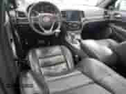 2019 Jeep Grand Cherokee Overland with VIN 1C4RJFCT0KC539751, listed as a Copart auction lot 46580295 with 48,768 mi miles and Salvage title. Bid and sale history available at DreamBid. Image 8.