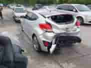 2014 Hyundai Veloster Turbo with VIN KMHTC6AE6EU206856, listed as a IAAI auction lot 42322693 with 111,716 mi miles and . Bid and sale history available at DreamBid. Image 3.