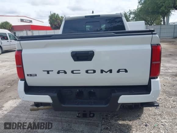 2025 Toyota Tacoma SR5 with VIN 3TMKB5FN2SM028806, listed as a IAAI auction lot 43258727 with 10,320 mi miles and . Bid and sale history available at DreamBid. Image 16.