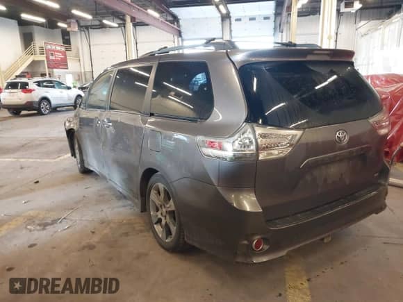 2011 Toyota Sienna SE with VIN 5TDXK3DC7BS034516, listed as a IAAI auction lot 41539955 with 209,309 mi miles and . Bid and sale history available at DreamBid. Image 3.