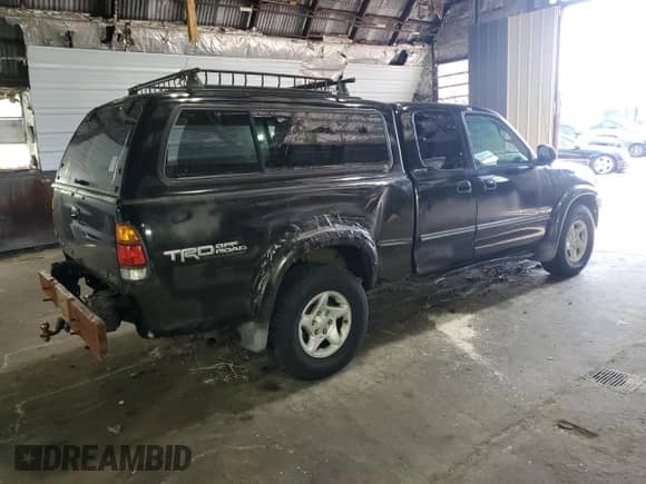 2001 Toyota Tundra Limited z VIN 5TBBT48141S154805, wystawiony jako Copart lot #66225125 z przebiegiem 216 119 mil mil oraz Czysty tytuł • Clean title. Historia ofert i sprzedaży dostępna na DreamBid. Obrazek 3.