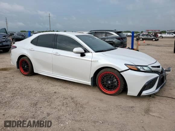 2021 Toyota Camry Hybrid XSE with VIN 4T1K31AK7MU028992, listed as a Copart auction lot 65379895 with 62,735 mi miles and Salvage title. Bid and sale history available at DreamBid. Image 4.