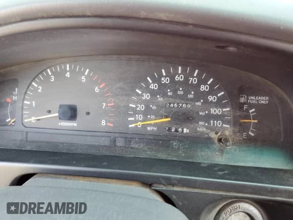 1997 Toyota Tacoma z VIN 4TAWN72N2VZ264266, wystawiony jako Copart lot #55149775 z przebiegiem 245 769 mil mil oraz Szkoda całkowita • Salvage title. Historia ofert i sprzedaży dostępna na DreamBid. Obrazek 9.