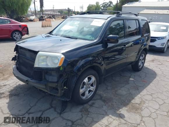 2013 Honda Pilot EX-L with VIN 5FNYF3H58DB019857, listed as a IAAI auction lot 43050717 with 152,188 mi miles and . Bid and sale history available at DreamBid. Image 2.