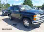 1998 Chevrolet Tahoe z VIN 3GNEK18R6WG119630, wystawiony jako IAAI lot #43103849 z przebiegiem 253 439 mil mil oraz . Historia ofert i sprzedaży dostępna na DreamBid. Obrazek 1.