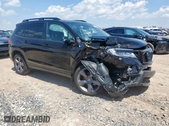 2021 Honda Passport Touring с VIN 5FNYF7H90MB010998, выставлен на аукционе Copart как лот 68742275 с пробегом Не указан миль и Списание • Salvage title. История ставок и продаж доступна на DreamBid. Изображение 4.