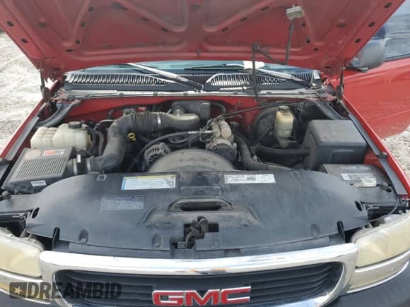 1999 GMC Sierra 1500 SL with VIN 1GTEC14W3XZ536612, listed as a Copart auction lot 61235565 with 176,211 mi miles and Salvage title. Bid and sale history available at DreamBid. Image 11.