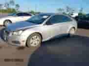 2013 Chevrolet Cruze LS with VIN 1G1PB5SG1D7140130, listed as a IAAI auction lot 43148418 with 97,790 mi miles and . Bid and sale history available at DreamBid. Image 2.