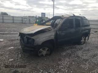 2005 Chevrolet TrailBlazer LS с VIN 1GNDS13S452121647, выставлен на аукционе Copart как лот 76577833 с пробегом Не указан миль и Списание • Salvage title. История ставок и продаж доступна на DreamBid. Изображение 1.