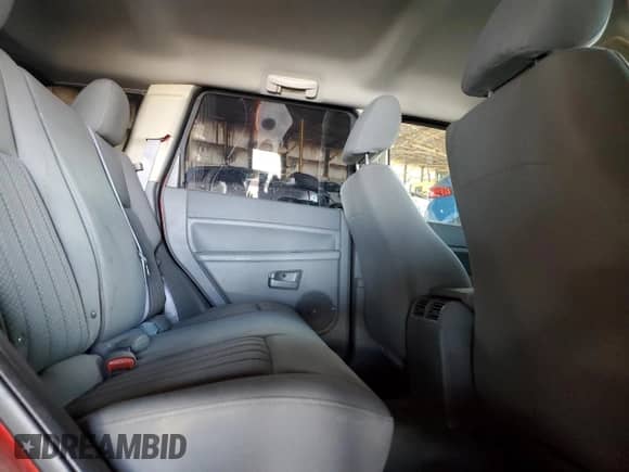 2006 Jeep Grand Cherokee Laredo z VIN 1J4HS48N06C254653, wystawiony jako Copart lot #45568855 z przebiegiem 105 639 mil mil oraz Szkoda całkowita • Salvage title. Historia ofert i sprzedaży dostępna na DreamBid. Obrazek 11.