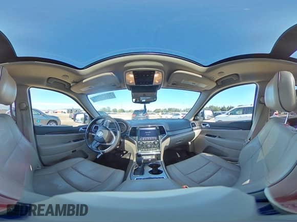 2018 Jeep Grand Cherokee Overland z VIN 1C4RJFCG8JC108074, wystawiony jako Copart lot #70324275 z przebiegiem 63 778 mil mil oraz Szkoda całkowita • Salvage title. Historia ofert i sprzedaży dostępna na DreamBid. Obrazek 14.