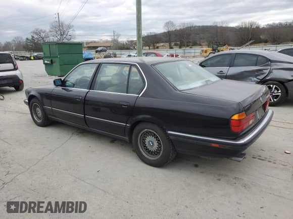 1994 BMW 7 Series with VIN WBAGD8328RDE92782, listed as a Copart auction lot 85501294 with 107,938 mi miles and Clean title. Bid and sale history available at DreamBid. Image 2.
