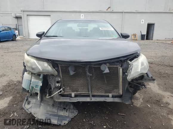 2012 Toyota Camry XLE with VIN 4T1BK1FK7CU005321, listed as a Copart auction lot 86333835 with 318,899 mi miles and Salvage title. Bid and sale history available at DreamBid. Image 5.