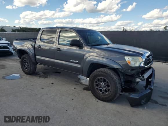 2012 Toyota Tacoma PreRunner with VIN 3TMJU4GN2CM128372, listed as a Copart auction lot 86145125 with 177,960 mi miles and Salvage title. Bid and sale history available at DreamBid. Image 4.
