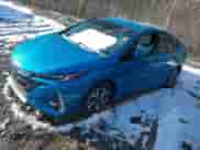 2018 Toyota Prius Plus z VIN JTDKARFP2J3069383, wystawiony jako IAAI lot #41595534 z przebiegiem 164 481 mil mil oraz . Historia ofert i sprzedaży dostępna na DreamBid. Obrazek 2.