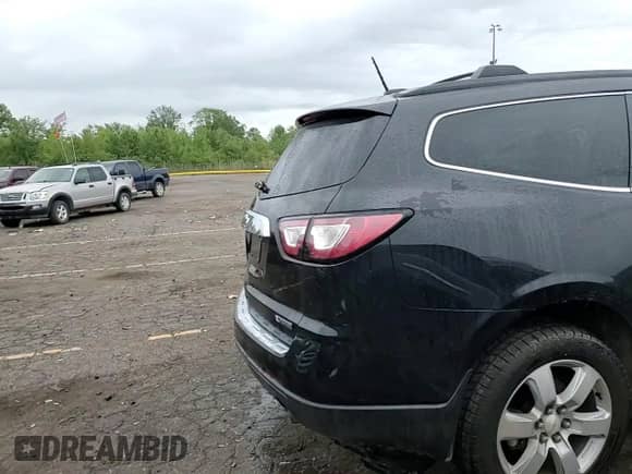 2017 Chevrolet Traverse Premier z VIN 1GNKRJKD0HJ130555, wystawiony jako Copart lot #69190945 z przebiegiem 78 145 mil mil oraz Czysty tytuł • Clean title. Historia ofert i sprzedaży dostępna na DreamBid. Obrazek 14.