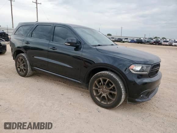 2016 Dodge Durango Limited with VIN 1C4RDJDG1GC430427, listed as a Copart auction lot 71283905 with 124,376 mi miles and Salvage title. Bid and sale history available at DreamBid. Image 4.