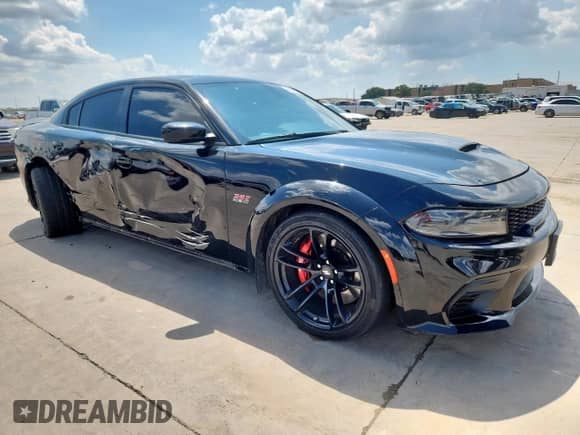 2021 Dodge Charger Scat Pack with VIN 2C3CDXGJ1MH621679, listed as a Copart auction lot 69690845 with 48,610 mi miles and Clean title. Bid and sale history available at DreamBid. Image 4.