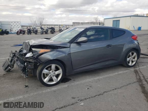 2014 Hyundai Veloster z VIN KMHTC6AD8EU194443, wystawiony jako Copart lot #60059565 z przebiegiem 201 848 mil mil oraz Szkoda całkowita • Salvage title. Historia ofert i sprzedaży dostępna na DreamBid. Obrazek 1.