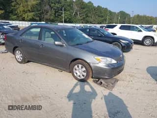 2003 Toyota Camry XLE with VIN 4T1BE32K53U668153, listed as a IAAI auction lot 43249059 with 194,101 mi miles and . Bid and sale history available at DreamBid. Image 1.