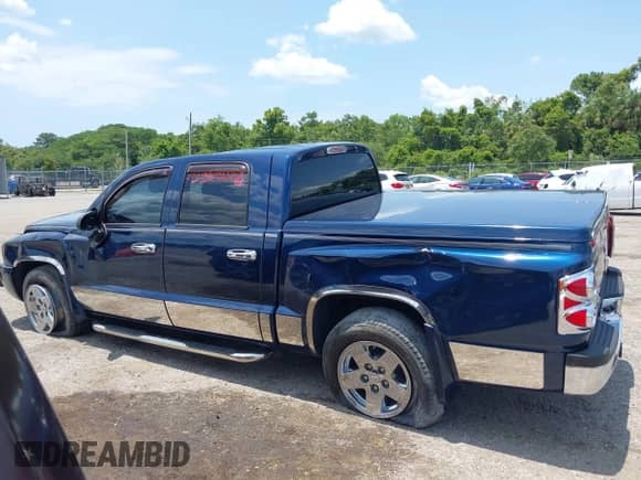 2006 Dodge Dakota SLT with VIN 1D7HE48K96S503482, listed as a IAAI auction lot 42412162 with 127,360 mi miles and . Bid and sale history available at DreamBid. Image 14.